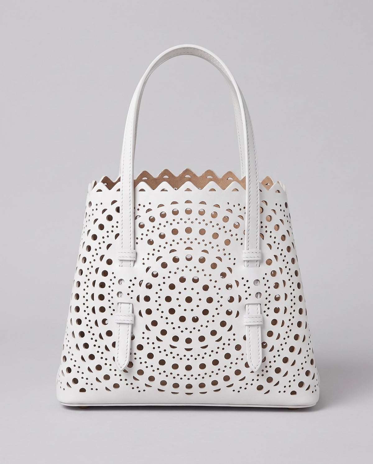 Hardware and handle detail on the Valentina Urbino Large bag in White