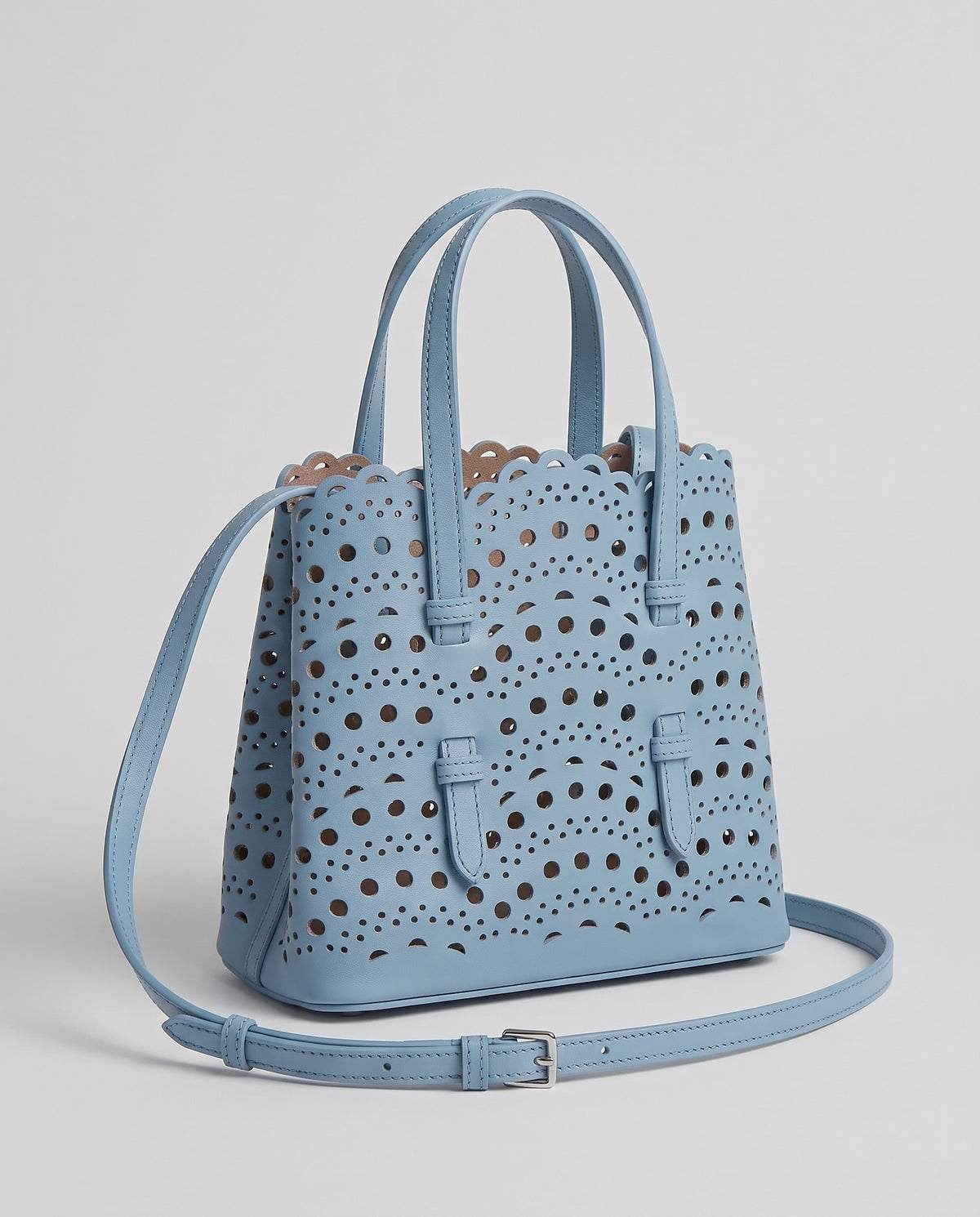 Hardware and handle detail on the Valentina Urbino Medium bag in Sky