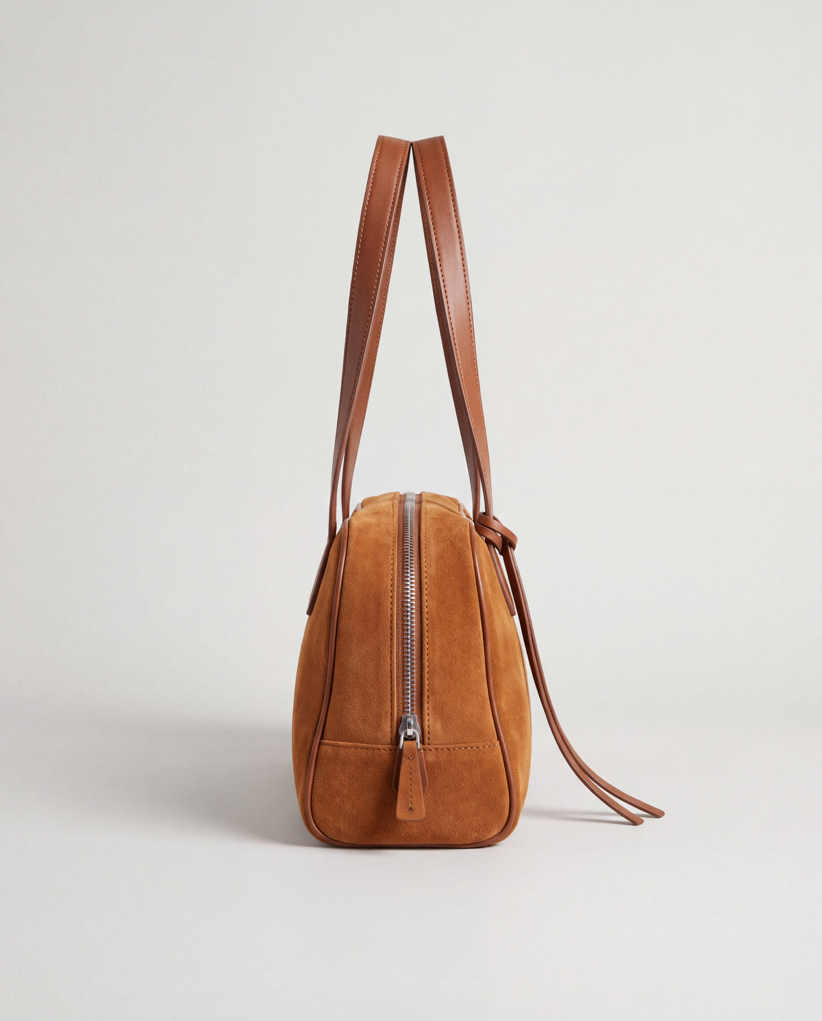 Valentina Linea suede shoulder bag in Brown, side view showing the end zip