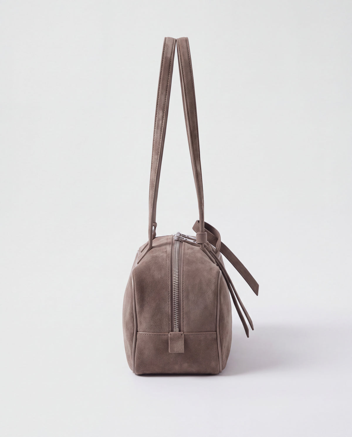 Valentina Linea suede shoulder bag in Taupe, side view showing the end zip