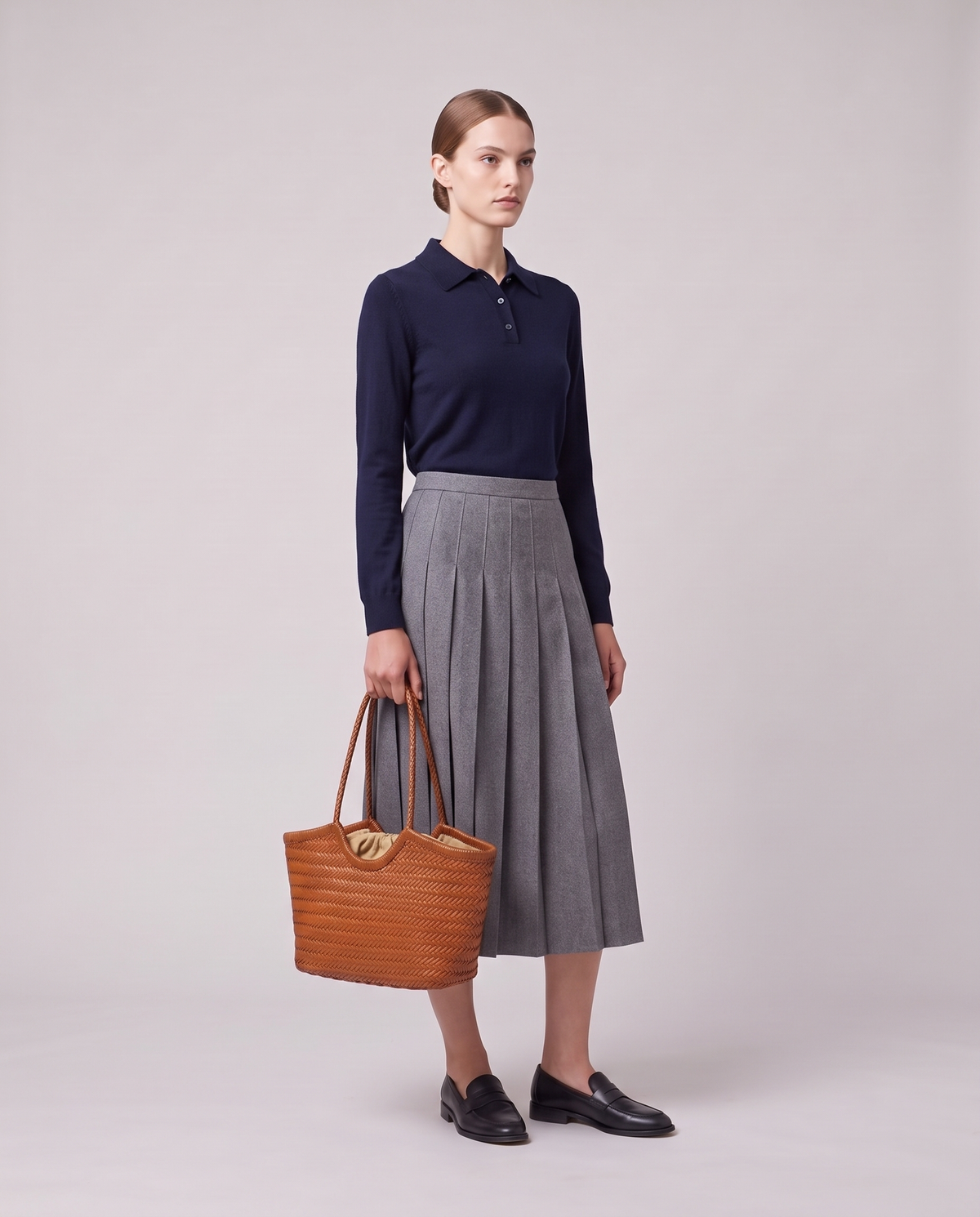 Model holding the Valentina Matera Large bag in Caramel, full length