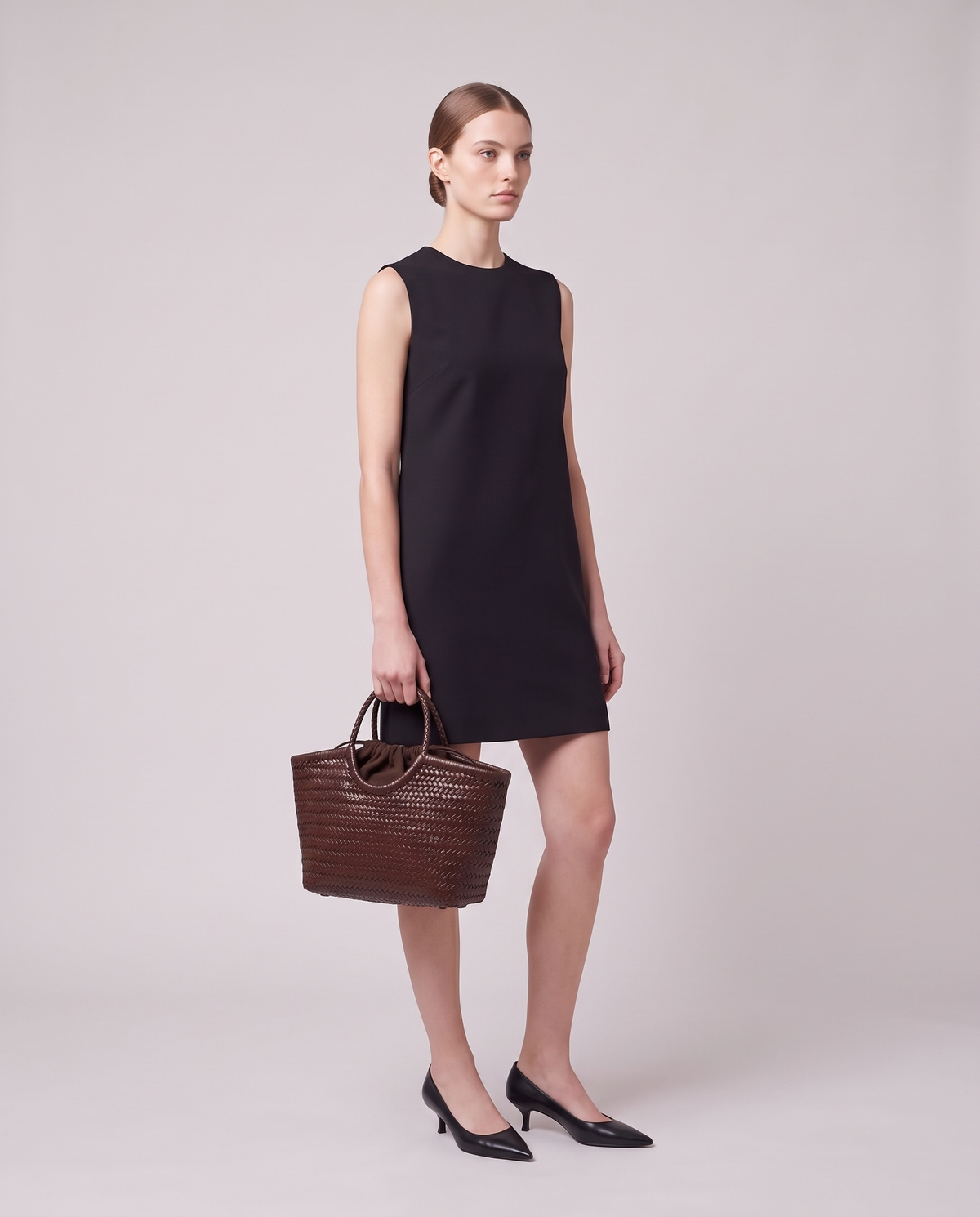 Model carrying the Valentina Matera Small bag in Brown