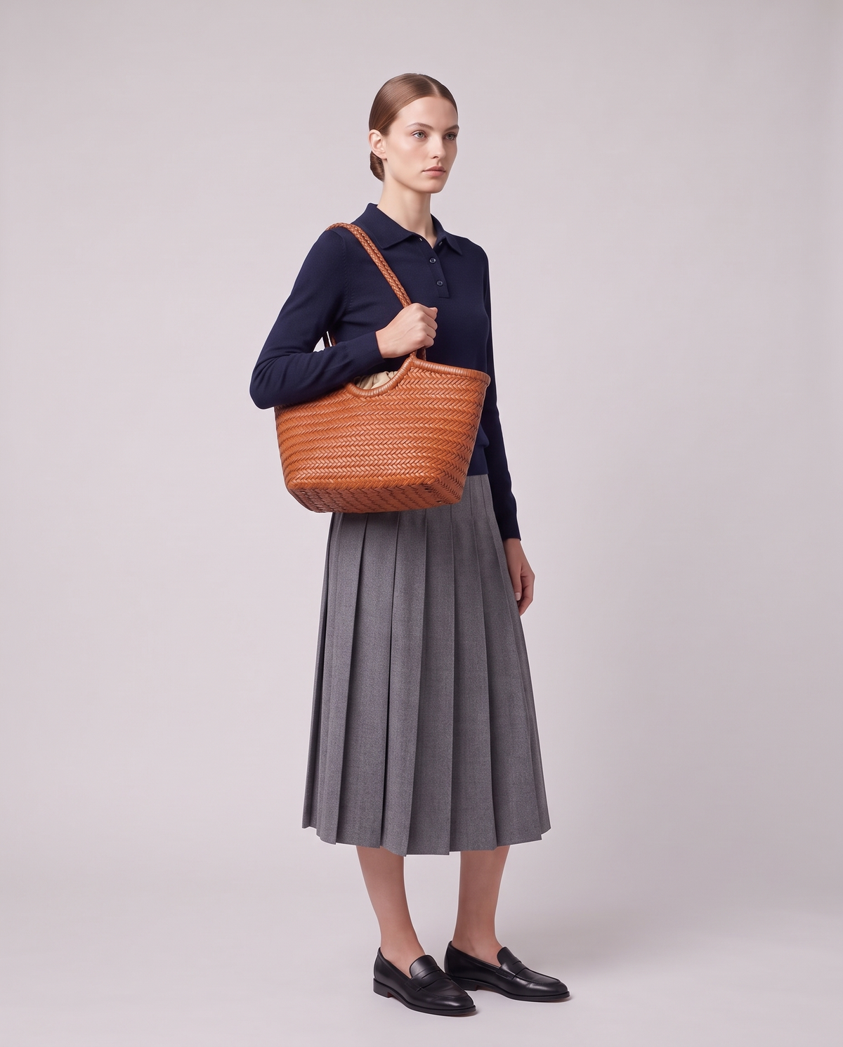Model carrying the Valentina Matera Small bag in Caramel