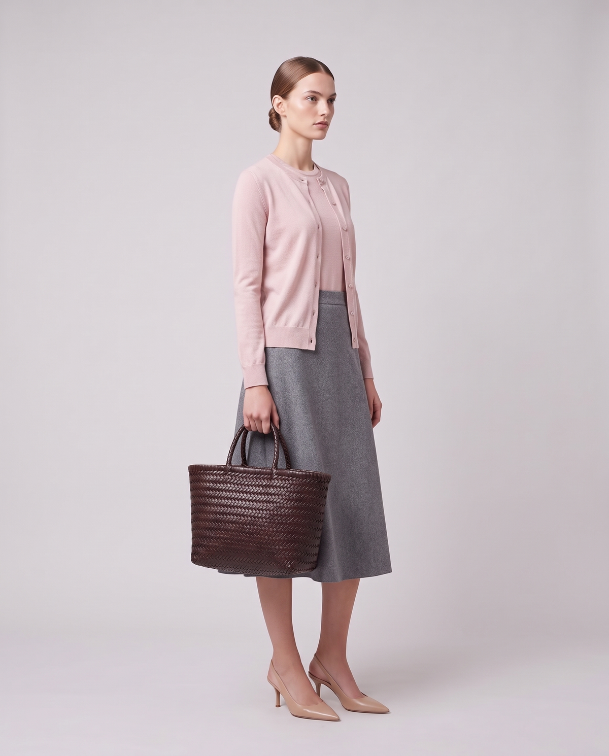 Model carrying the Valentina Noto Small bag in Burgundy
