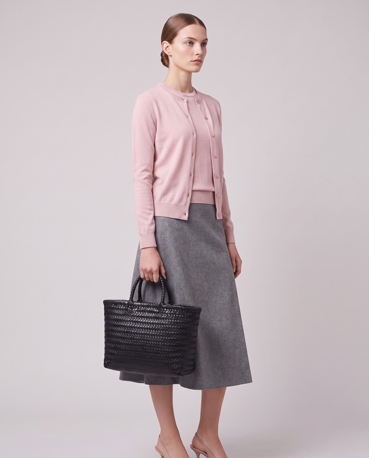 Model carrying the Valentina Noto Small bag in Onyx