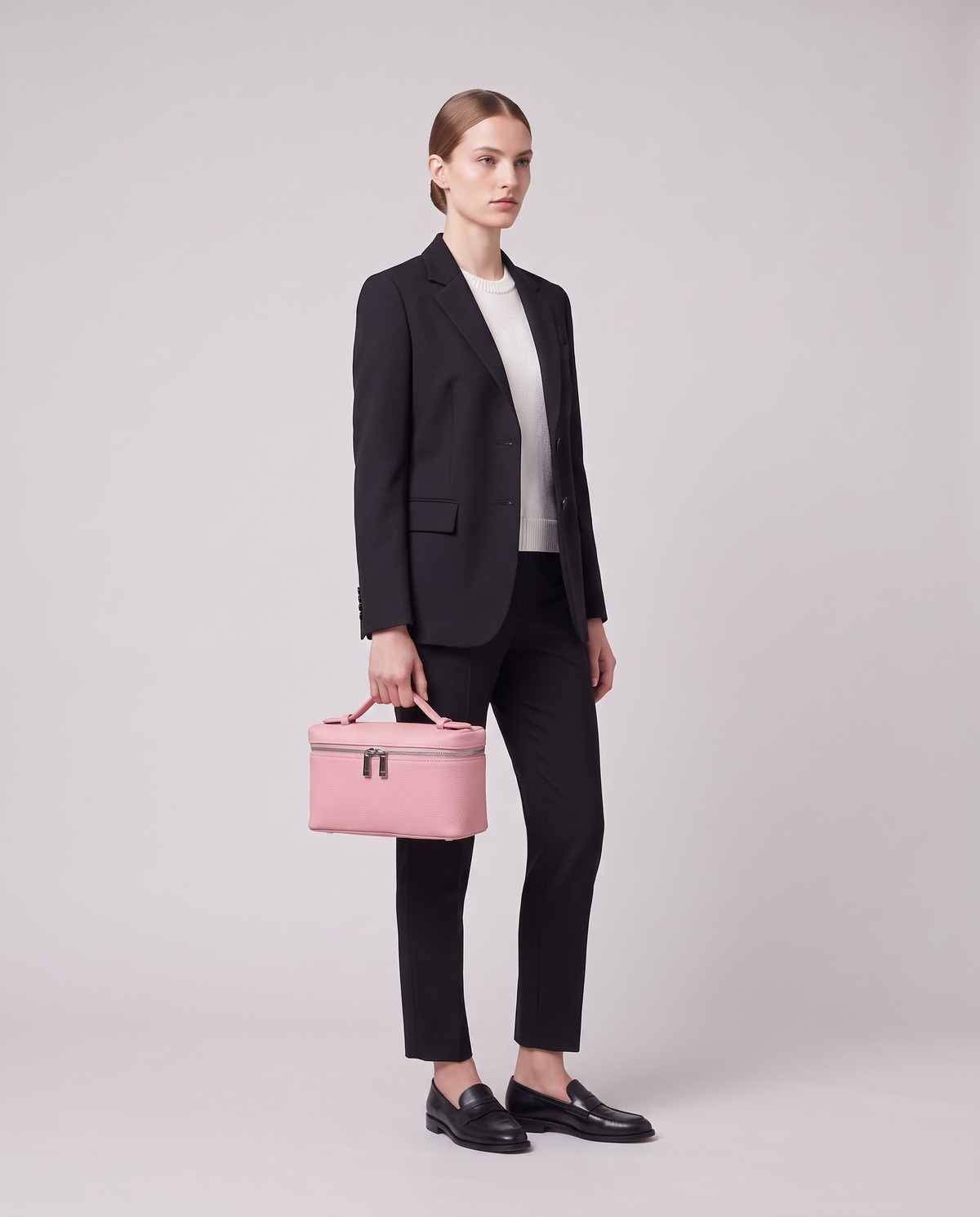 Model holding the Valentina Orvieto Small top-handle bag in Purple leather, full length