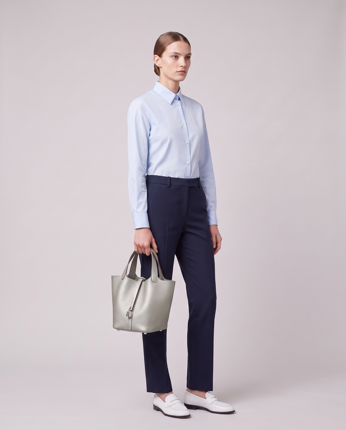 Model carrying the Valentina Ostuni Large bag in Ivory