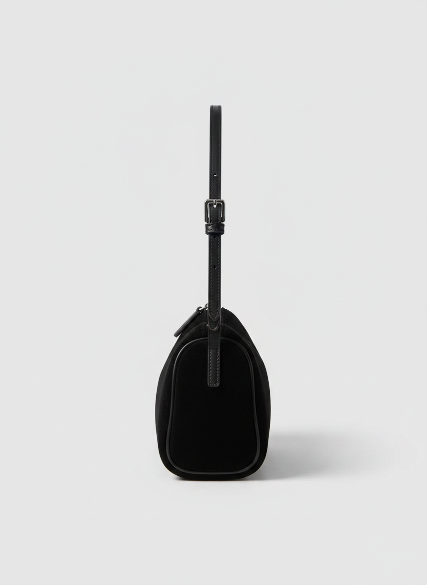 Valentina Roma barrel bag in black suede, side view