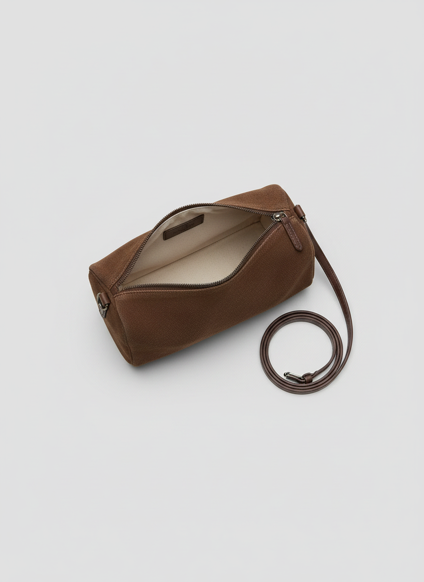 Valentina Roma barrel bag in chocolate suede, open from above showing the interior