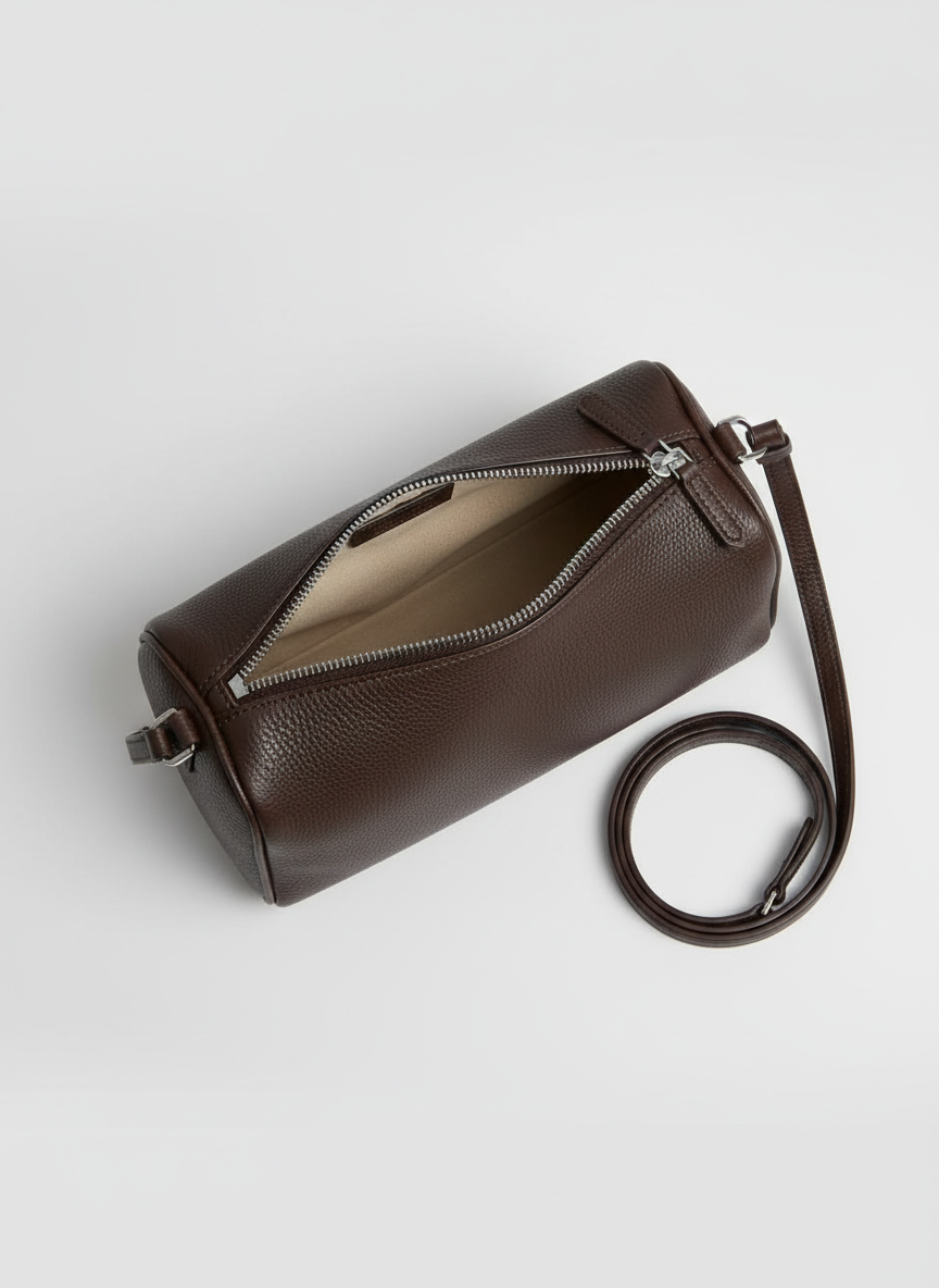 Valentina Roma barrel bag in espresso leather, open from above showing the interior