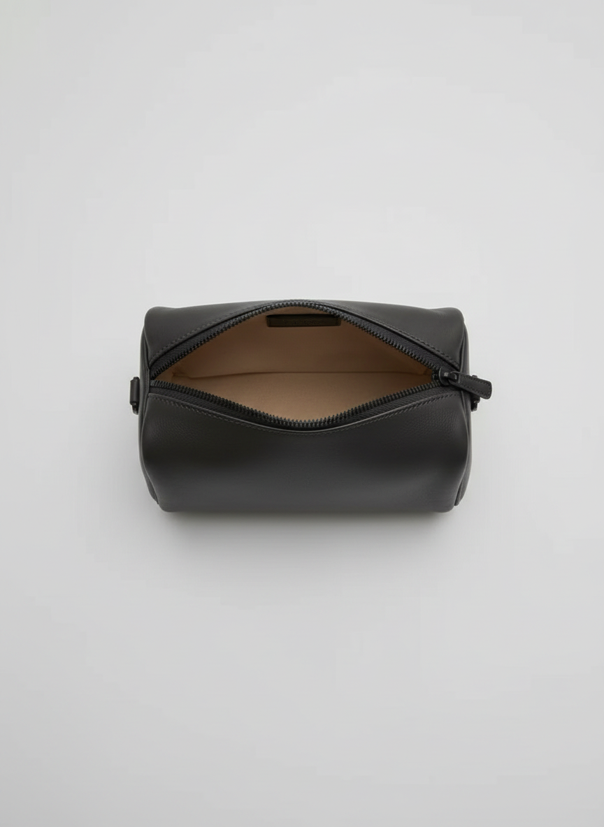 Valentina Roma barrel bag in charcoal leather, open from above showing the interior