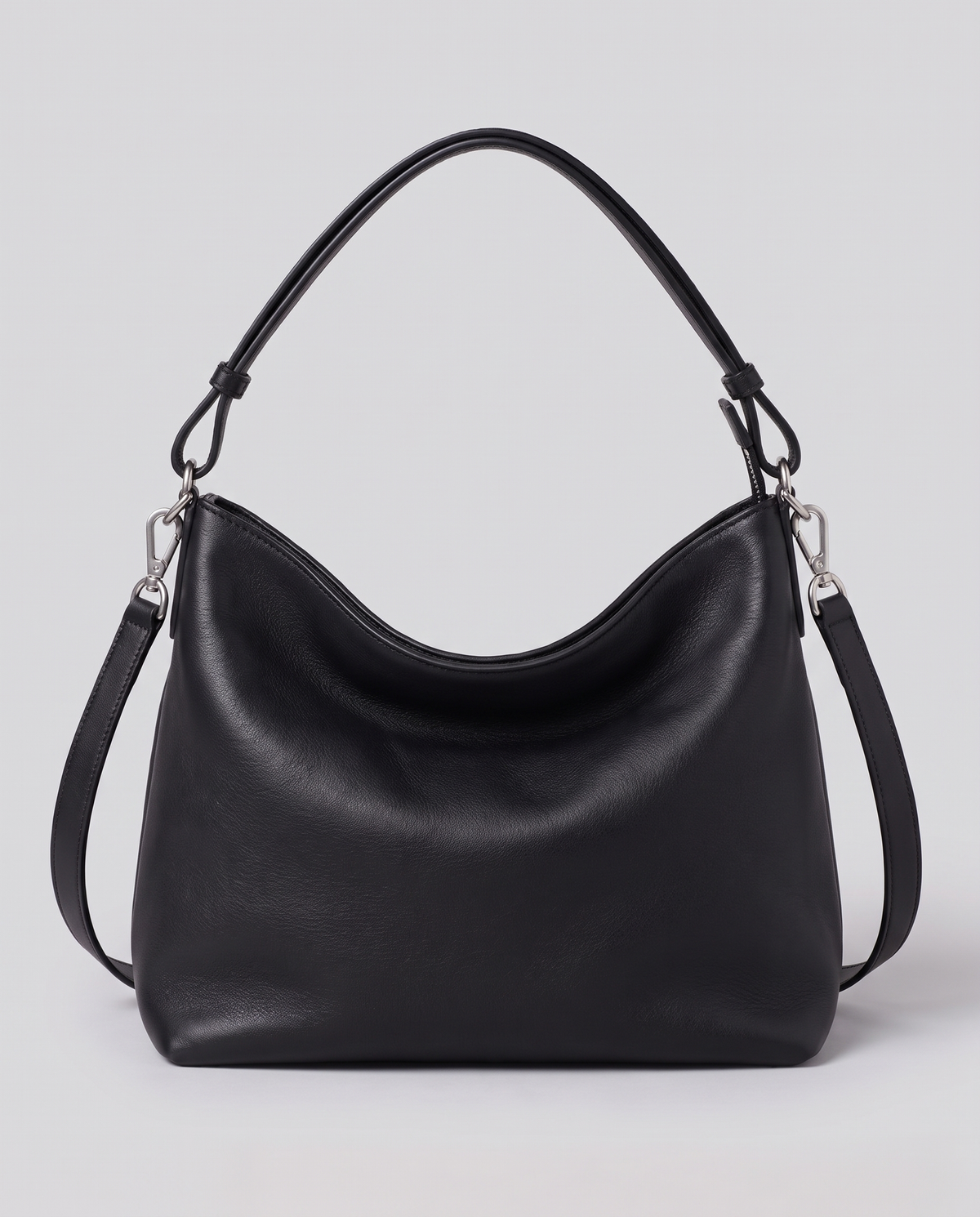 Hardware and handle detail on the Valentina Velluto Large bag in Black