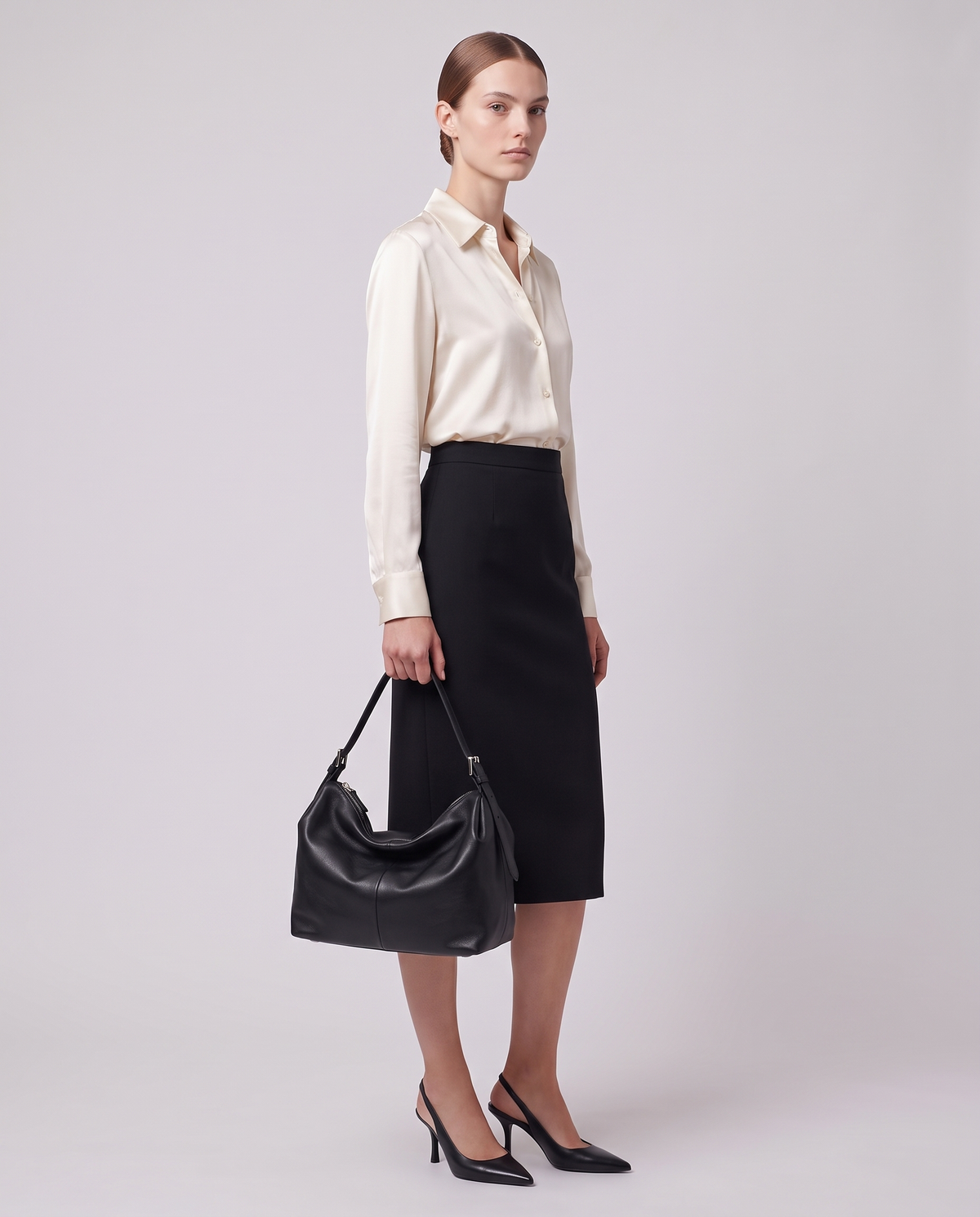 Model carrying the Valentina Velluto Large bag in Black