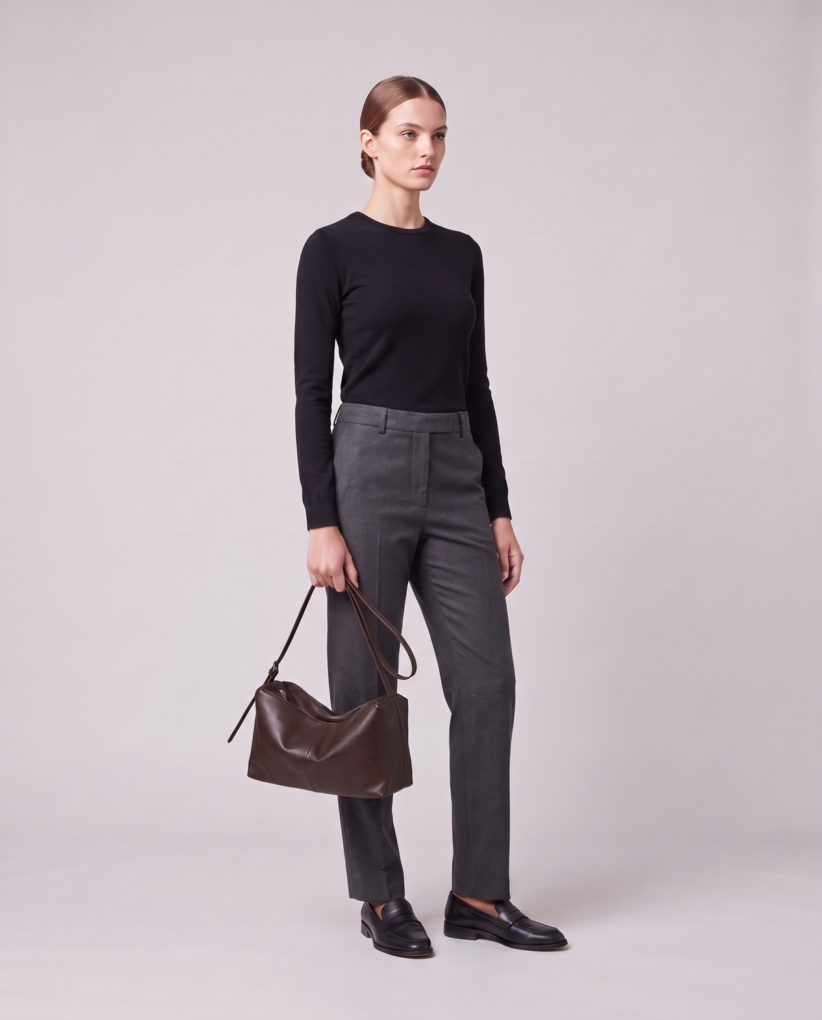 Model holding the Valentina Velluto Large bag in Chocolate, full length