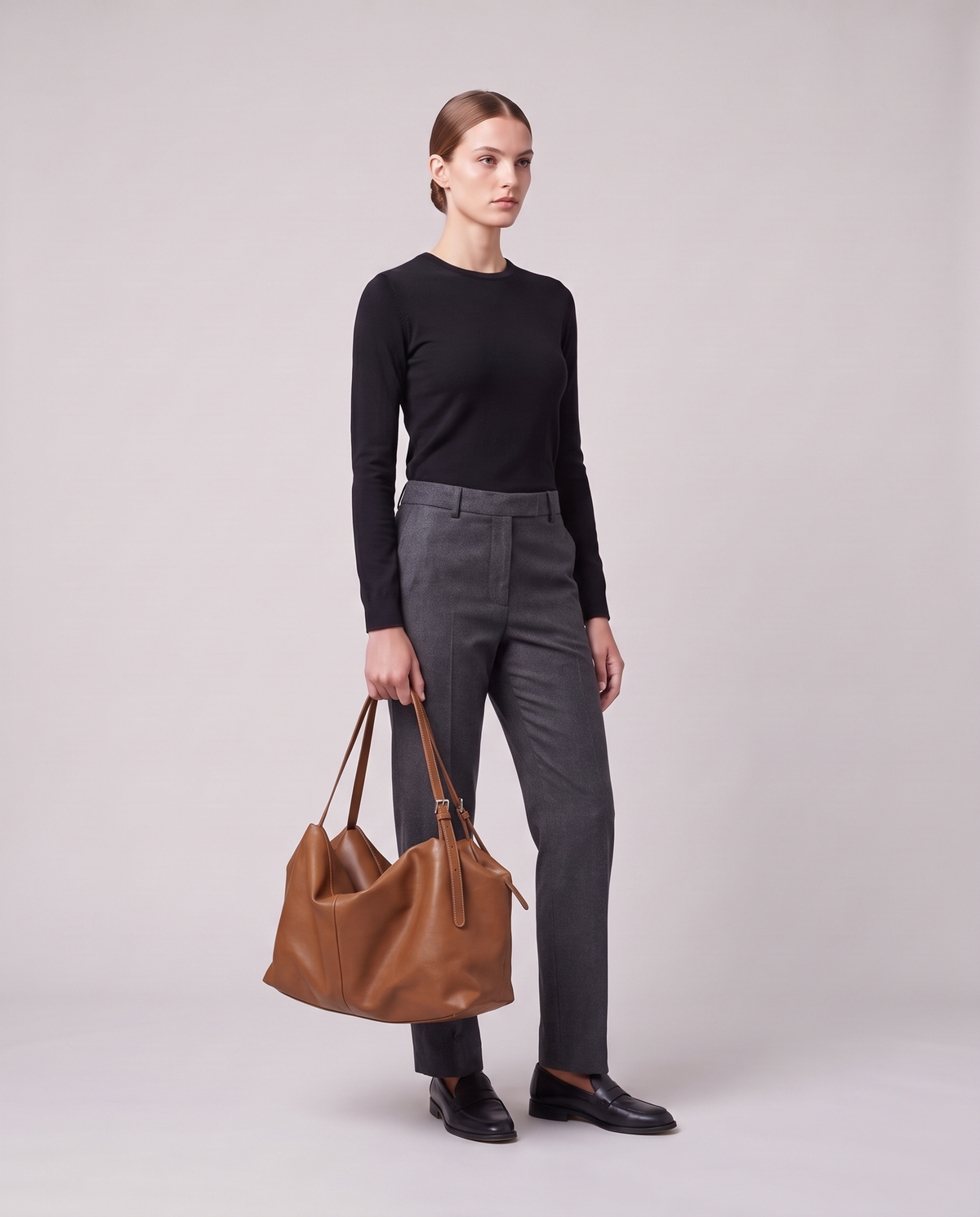 Model holding the Valentina Velluto Small bag in Caramel, full length