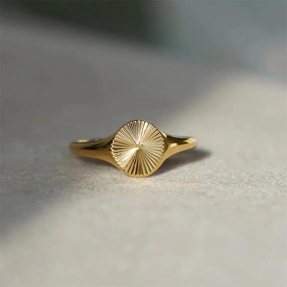 Gold sun signet ring